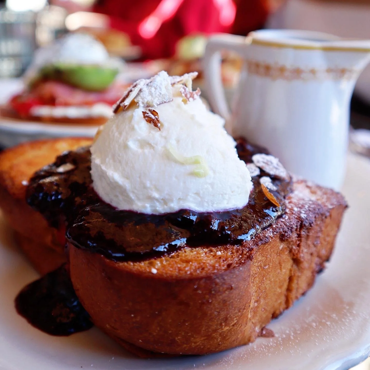 The Essential signature dishes Ricotta Toast, various seasonal salads and sandwiches, handmade pastas, roasted chicken, renowned pastries and baked goods (especially croissants).